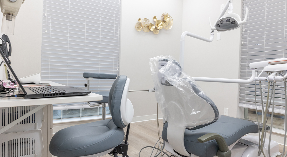Close up of dark blue dental exam chair